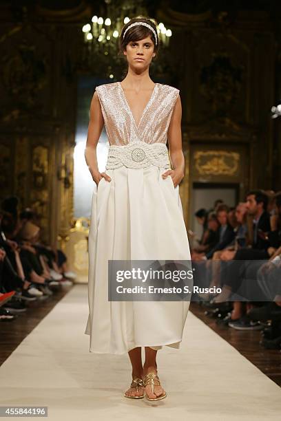 Model walks the runway during the Elisabetta Franchi - Show as part of Milan Fashion Week Womenswear Spring/Summer 2015 on September 20, 2014 in...