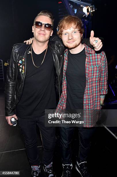 Recording artists Macklemore and Ed Sheeran attend the 2014 iHeartRadio Music Festival at the MGM Grand Garden Arena on September 20, 2014 in Las...