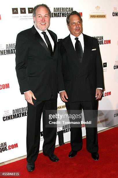 Director Jon Turteltaub and actor Jon Lovitz arrive at the 27th American Cinematheque Award honoring Jerry Bruckheimer at The Beverly Hilton Hotel on...