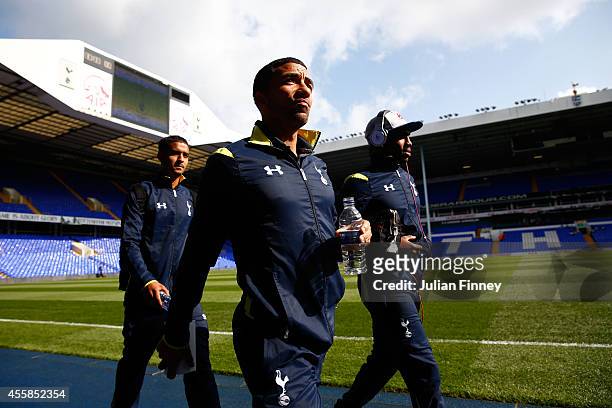 Kyle Naughton, Aaron Lennon and Danny Rose of Spurs arrive at the stadium prior to kickoff during the Barclays Premier League match between Tottenham...