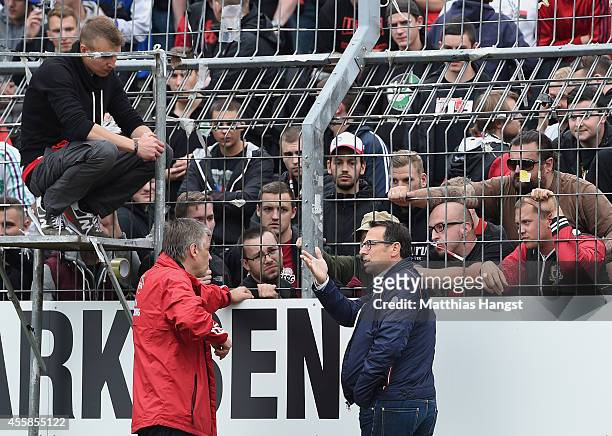 Sports director Martin Bader of Nuernberg speaks to the fans during the Second Bundesliga match between Karlsruher SC and 1. FC Nuernberg at Wildpark...