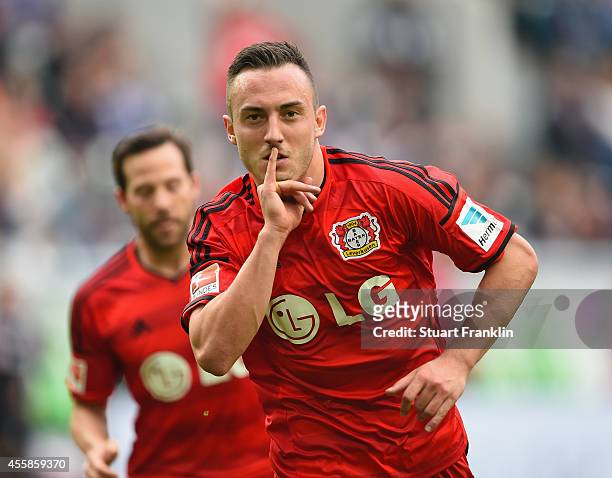 Josip Drmic of Leverkusen celebrates scoring his goal during the Bundesliga match between VfL Wolfsburg and Bayer 04 Leverkusen at Volkswagen Arena...