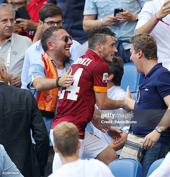 Alessandro Florenzi of AS Roma celebrates with his fans on the stands after scoring the second team's goal during the Serie A match between AS Roma...