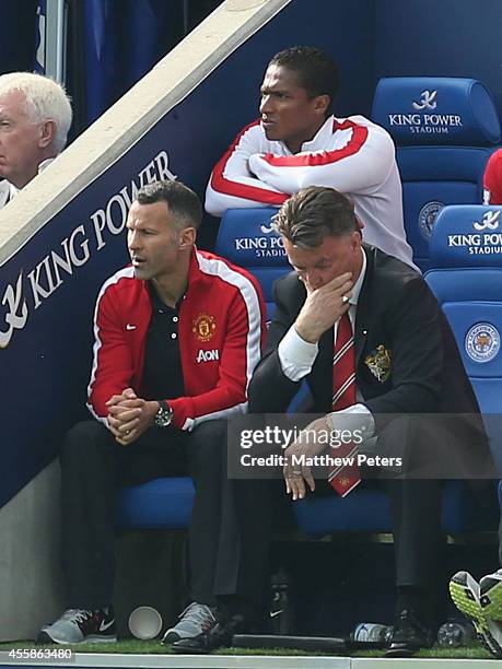 Assistant Manager Ryan Giggs and Manager Louis van Gaal of Manchester United show their disappointment during the Barclays Premier League match...