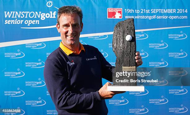 First place winner Paul Wesselingh of England poses with the trophy after winning the WINSTONgolf Senior Open played at WINSTONgolf on September 21,...