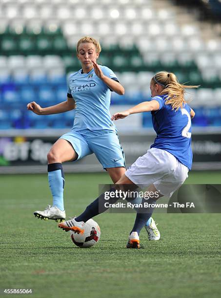 Toni Duggan of Manchester City ladies vies with Everton ladies Vicky Jones during the WSL match between Everton Ladies and Manchester City Ladies at...