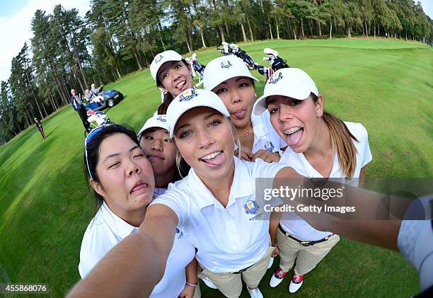 Sierra Brooks of Team USA asks to borrow a camera for a Selfie with her lady team mates, Amy Lee, Andrea Lee, Kristen Gillman, Bethany Wu and Hannah...