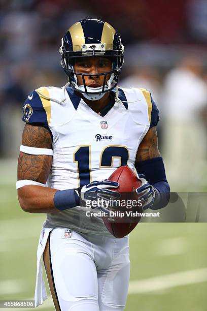 Stedman Bailey of the St. Louis Rams catches a pass during warm-ups prior to a game between the St. Louis Rams and the Dallas Cowboys at the Edward...