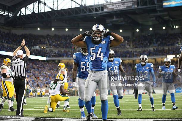 DeAndre Levy of the Detroit Lions celebrates after tackling Eddie Lacy of the Green Bay Packers for a safety during the second quarter of the game at...