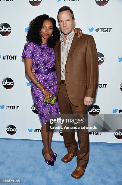 Actor Tom Verica and Kira Arne arrive at the #TGIT Premiere Event hosted by Twitter at Palihouse Holloway on September 20, 2014 in West Hollywood,...