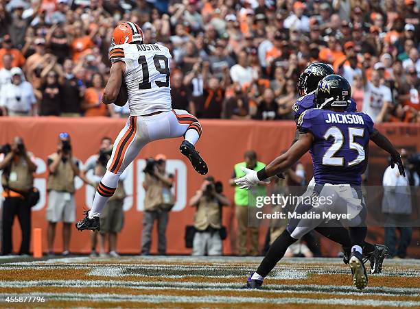 Miles Austin of the Cleveland Browns makes a catch for a touchdown during the third quarter in front of Asa Jackson of the Baltimore Ravens at...