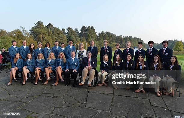 The European and USA teams pose for a photograph during the Opening Ceremony of the 2014 Junior Ryder Cup at Blairgowrie Golf Club on September 21,...