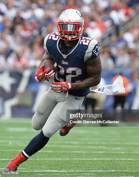 Stevan Ridley of the New England Patriots carries the ball during the third quarter against the Oakland Raiders at Gillette Stadium on September 21,...