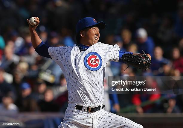 Kyuji Fujikawa of the Chicago Cubs pitches in the 7th inning against the Los Angeles Dodgers at Wrigley Field on September 21, 2014 in Chicago,...