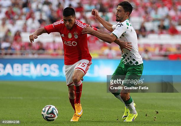 Benfica's midfielder Enzo Perez and Moreirense FC's midfielder Andre Simoes in action during the Portuguese First League match SL Benfica v...
