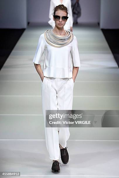 Model walks the runway during the Giorgio Armani Ready to Wear show as a part of Milan Fashion Week Womenswear Spring/Summer 2015 on September 20,...