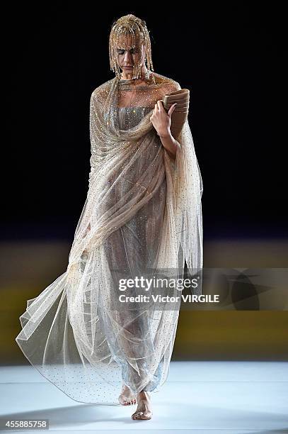 Model walks the runway during the Giorgio Armani Ready to Wear show as a part of Milan Fashion Week Womenswear Spring/Summer 2015 on September 20,...
