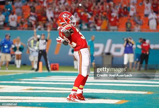 Running back Cyrus Gray of the Kansas City Chiefs celebrates his fourth-quarter touchdown against the Miami Dolphins in their game at Sun Life...
