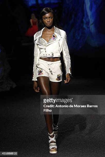 Model walks the runway during the Philipp Plein show as a part of Milan Fashion Week Menswear Spring/Summer 2015 on September 19, 2014 in Milan,...