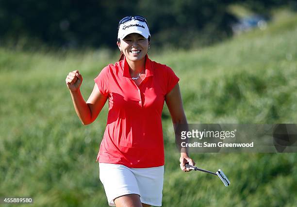 Mi Jung Hur of South Korea reacts to a birdie putt on the 11th hole during the final round of the Yokohama Tire LPGA Classic at the Robert Trent...