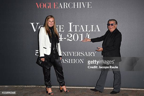 Eva Cavalli and Roberto Cavalli attend Vogue Italia 50th Anniversary during Milan Fashion Week Womenswear Spring/Summer 2015 on September 21, 2014 in...