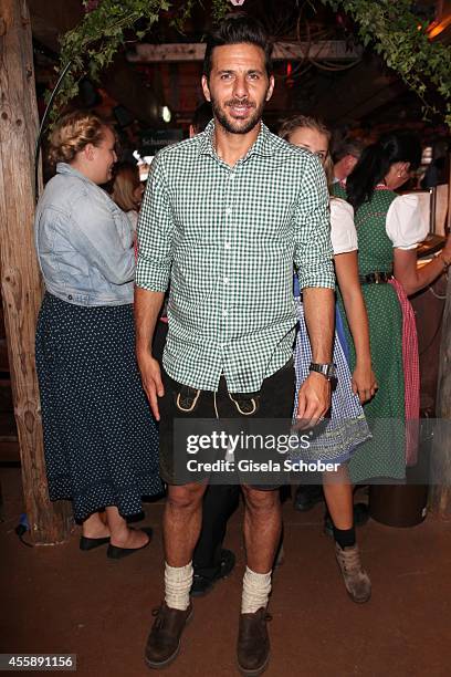 Bayern soccer player Claudio Pizarro during Wiesn - Oktoberfest at Theresienwiese on September 21, 2014 in Munich, Germany.