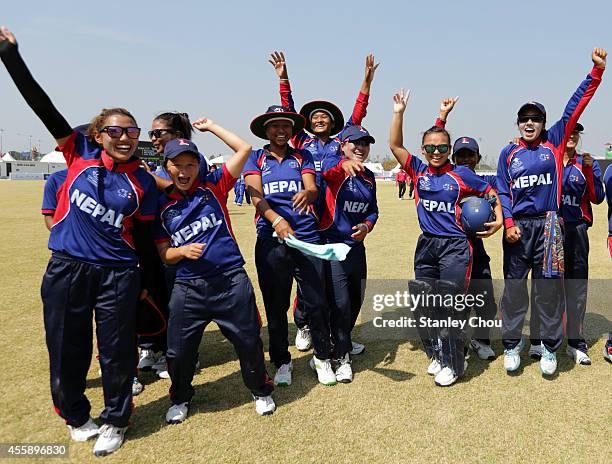 Nepal team celebrates after they defeated Malaysia during the Cricket Womens Group D match between Nepal and Malaysia during day three of the 2014...