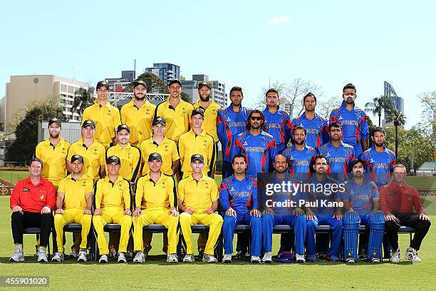 Western Australia XI and Afghanistan players together with match umpires pose for a team photo prior to the start of play during the One Day tour...