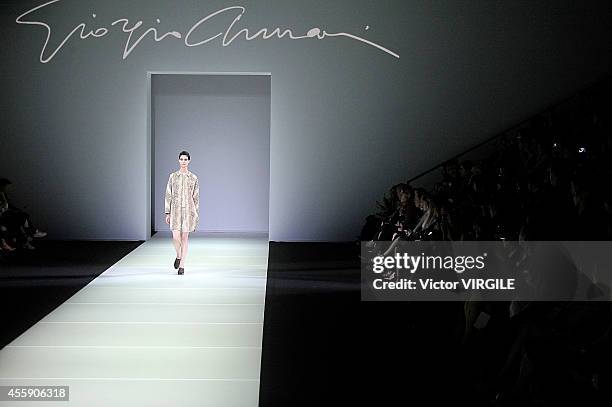 Model walks the runway during the Giorgio Armani Ready to Wear show as a part of Milan Fashion Week Womenswear Spring/Summer 2015 on September 20,...