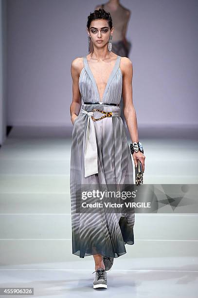 Model walks the runway during the Giorgio Armani Ready to Wear show as a part of Milan Fashion Week Womenswear Spring/Summer 2015 on September 20,...