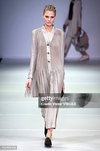 Model walks the runway during the Giorgio Armani Ready to Wear show as a part of Milan Fashion Week Womenswear Spring/Summer 2015 on September 20,...