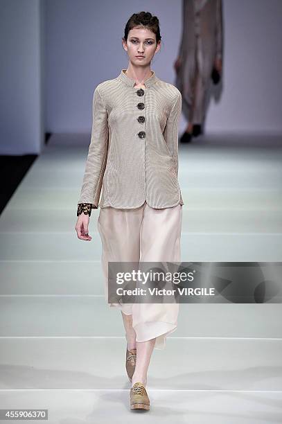 Model walks the runway during the Giorgio Armani Ready to Wear show as a part of Milan Fashion Week Womenswear Spring/Summer 2015 on September 20,...