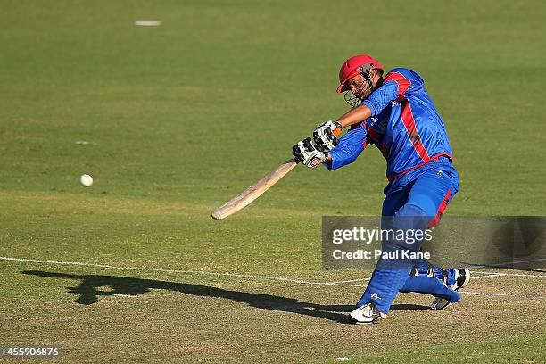 Mirwais Ashraf of Afghanistan bats during the One Day tour match between the Western Australia XI and Afghanistan at the WACA on September 22, 2014...