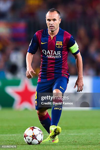 Andres Iniesta of FC Barcelona runs with the ball during the UEFA Champions League Group F match between FC Barcelona and APOEL FC at the Camp Nou...