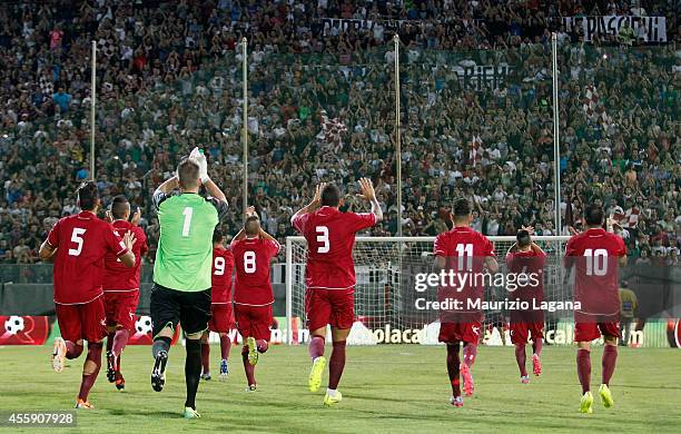 Players of Reggina salute their fans before the Lega Pro match between Reggina Calcio and ACR Messina at Stadio Oreste Granillo on September 12, 2014...