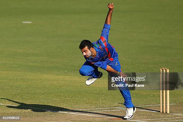 Dawlat Khan of Afghanistan bowls during the One Day tour match between the Western Australia XI and Afghanistan at the WACA on September 22, 2014 in...