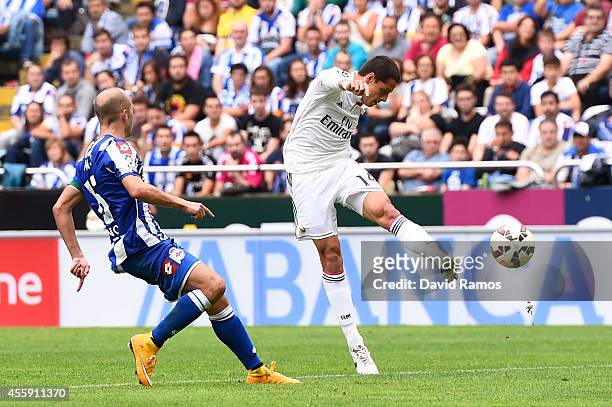 Chicharito Hernandez of Real Madrid CF scores his team's seventh goal during the La Liga match between RC Deportivo La Coruna and Real Madrid CF at...