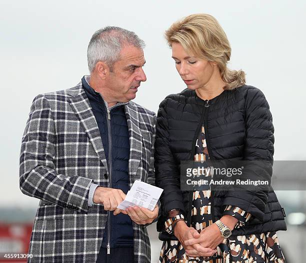 Paul McGinley, Captain of the Europe team and wife Allison McGinley talk as they wait for the arrival of the United States team at Edinburgh Airport...