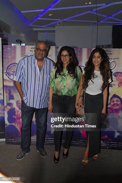 Bollywood actor Sridevi along with her husband Boney Kapoor and daughter Jhanvi during the screening of Marathi film Tapaal on September 20, 2014 in...