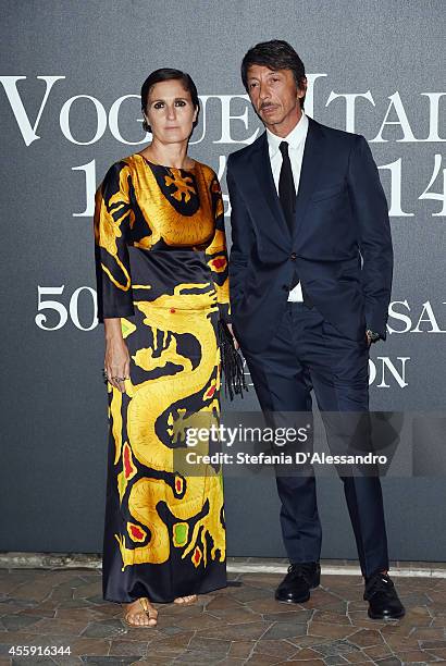 Maria Grazia Chiuri and Pier Paolo Piccioli attend Vogue Italia 50th Anniversary Event on September 21, 2014 in Milan, Italy.