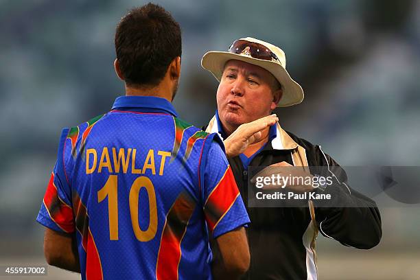 Andy Moles, head coach of Aghanistan talks with Dawlat Khan during the One Day friendly match between the Western Australia XI and Afghanistan at...