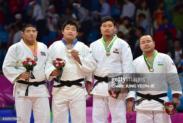 Silver medalist Mongolia's Duurenbayar Ulziibayar, gold medalist Japan's Takeshi Ojitani, bronze medalists South Korea's Kim Sung-Min and...