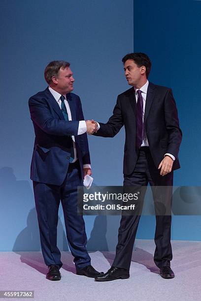 Ed Balls , the Shadow Chancellor of the Exchequer, is congratulated by Ed Miliband, the Leader of the Labour Party, after he delivered his speech to...