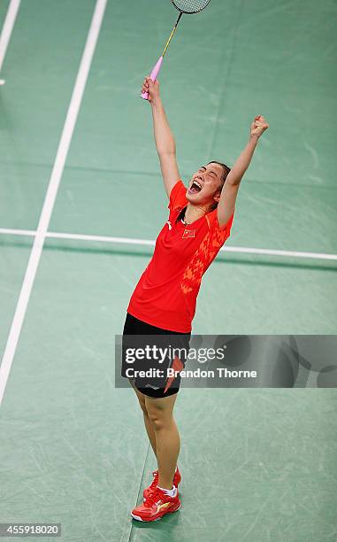 Shixian Wang of China celebrates match point to claim the Gold Medal for China in the Women's gold medal match during day three of the 2014 Asian...