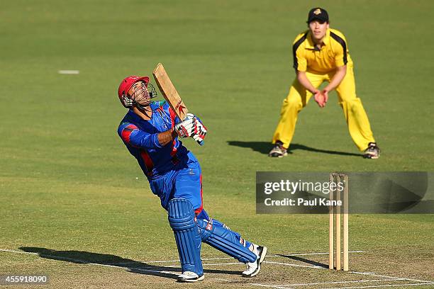 Mohammad Nabi of Afghanistan bats during the One Day tour match between the Western Australia XI and Afghanistan at the WACA on September 22, 2014 in...