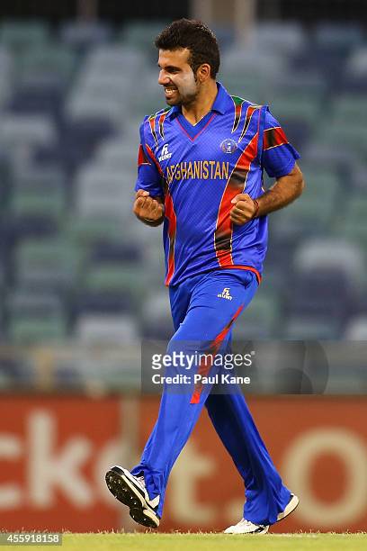 Dawlat Khan of Afghanistan celebrates after dismissing Luke Towers of the WA XI during the One Day tour match between the Western Australia XI and...