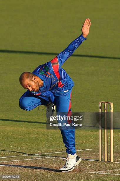 Mirwais Ashraf of Afghanistan bowls during the One Day tour match between the Western Australia XI and Afghanistan at the WACA on September 22, 2014...