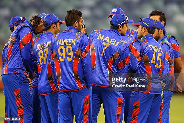 Mohammad Nabi of Afghanistan addresses his team before taking to the field during the One Day tour match between the Western Australia XI and...