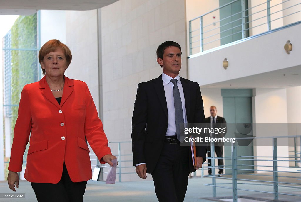 Germany's Chancellor Angela Merkel Meets France's Prime Minister Manuel Valls
