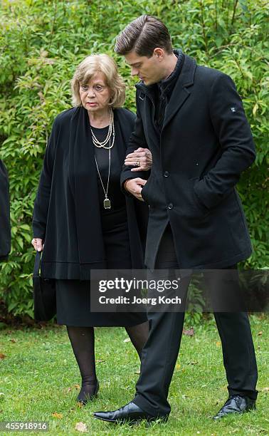 Grandchild Julien-Christopher Fuchsberger and widow Gundula 'Gundel' Fuchsberger go to the commemoration for decedent Joachim Fuchsberger on...